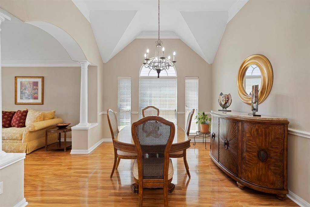 Expansive living areas include a family room, formal living and dining rooms, plus a dedicated home office.