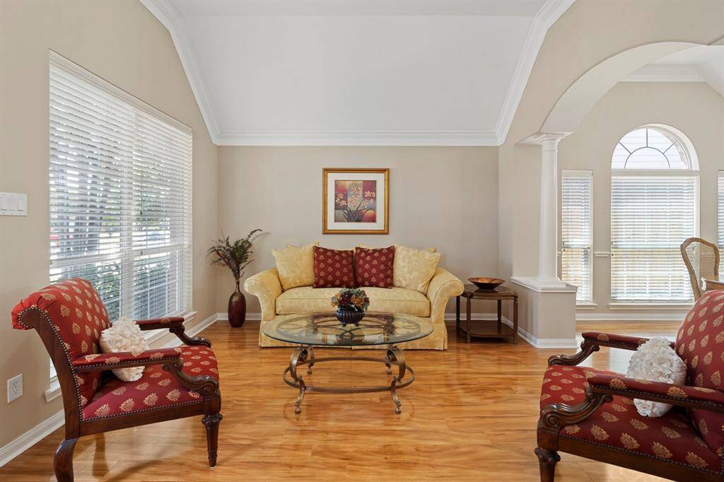 High ceilings create a sense of spaciousness and airiness, while neutral paint tones offer a timeless backdrop that complements any style and makes it easy to personalize the space.