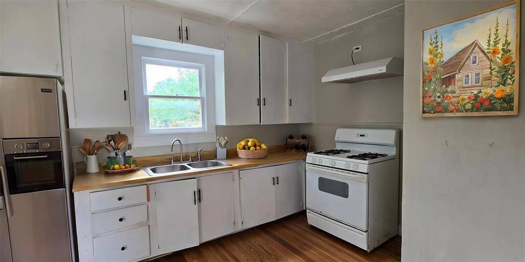 Original kitchen virtually staged.