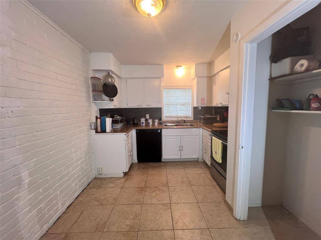Kitchen has room for breakfast table. There are washer dryer connections in the pantry