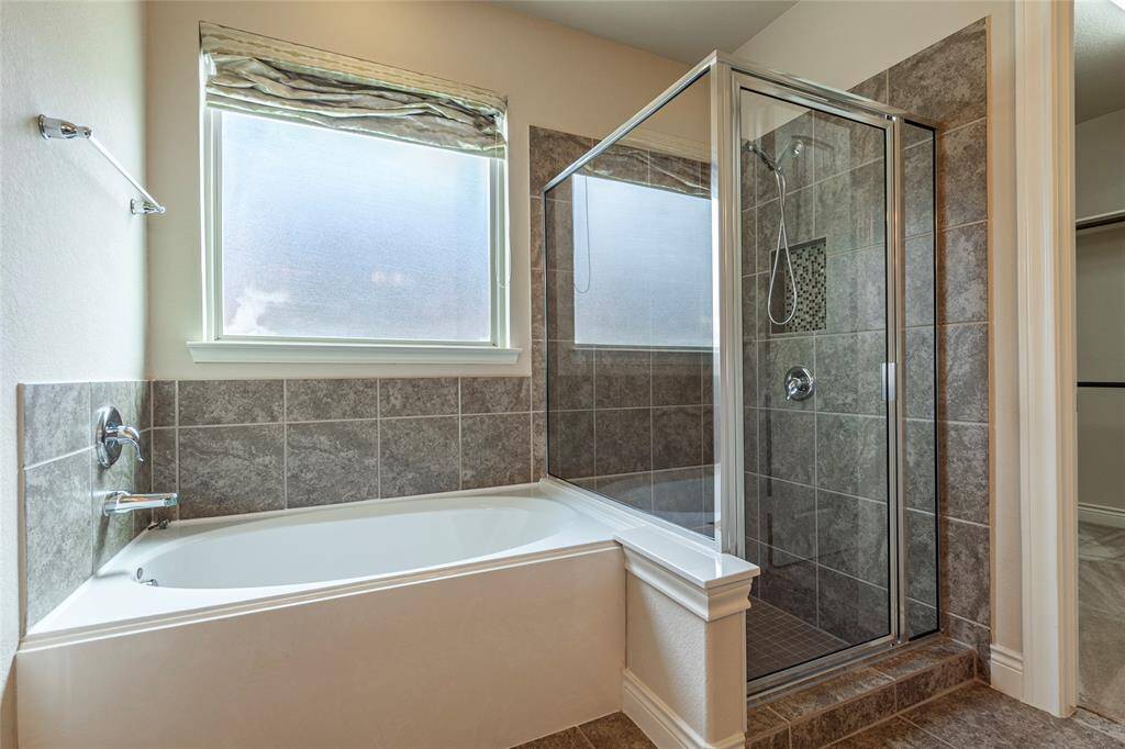Primary bath with soaking tub and separate shower