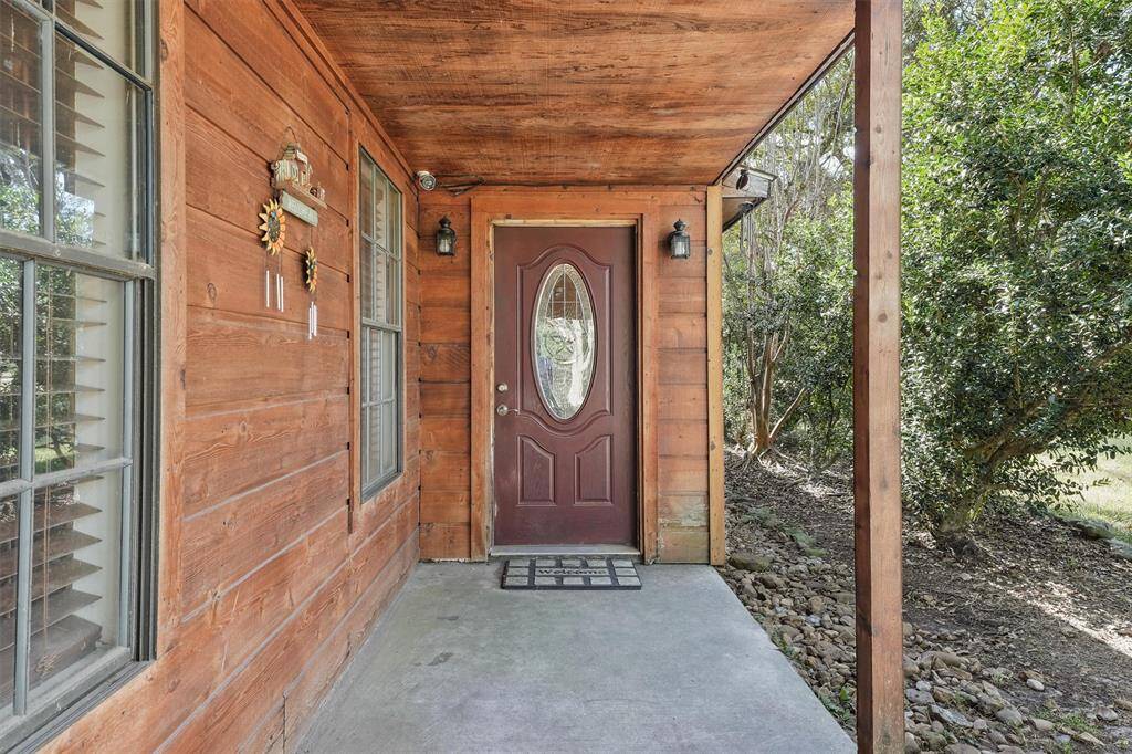 Front door with nice patio area