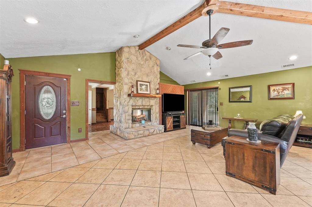 Living room with double sided fireplace