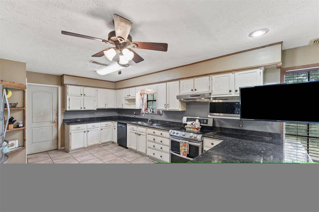 Kitchen with granite countertops