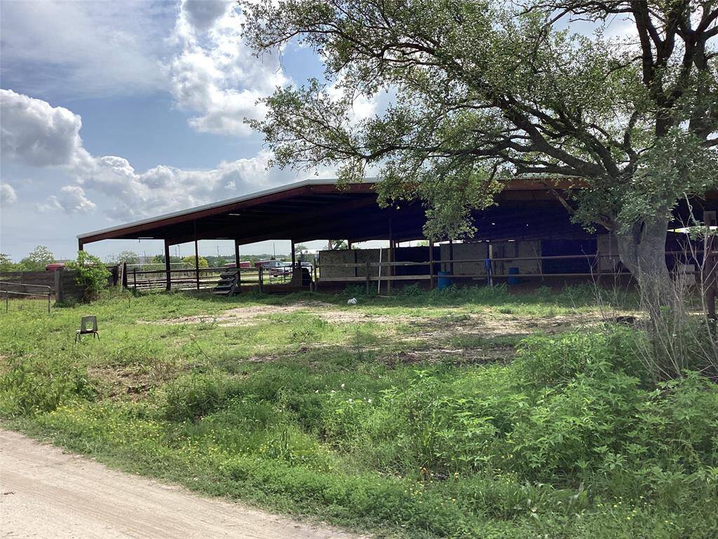 Stables with lighted covered arena at the back