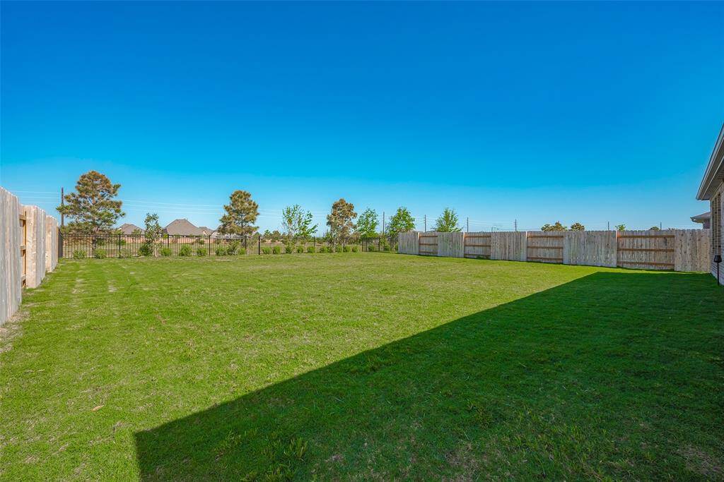 Huge space overlooking a beautiful and serene view filled with green space and water views.