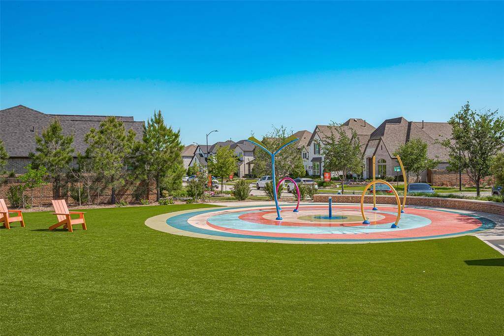 Enjoy family fun with a vibrant splash pad, perfect for cooling off and entertaining kids in a friendly community setting.