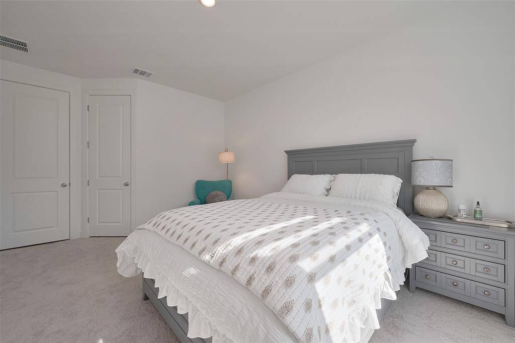 Bright and cozy bedroom with a neutral color palette. Perfect for relaxation.