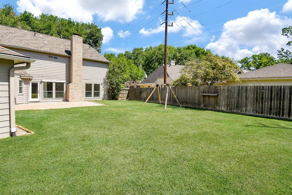 Spacious backyard perfect for outdoor activities and relaxation.