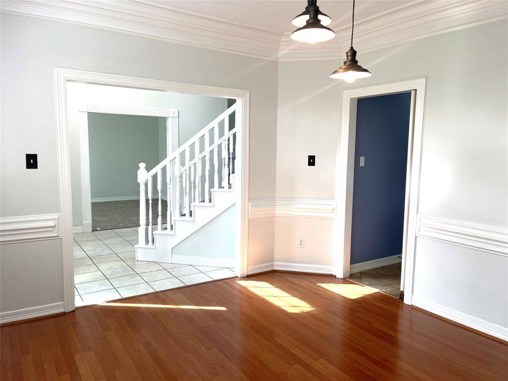 The dining room offers chair railing which brings tradition to this home. The dining room is conveniently located off the kitchen