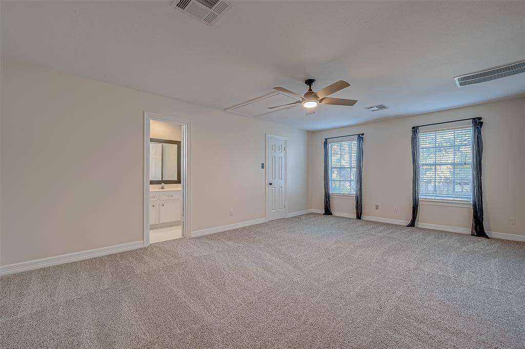 This secondary bedroom is located over the garage and has its own full bath and walk in closet.  Perfect for that teenager who wants their own space.