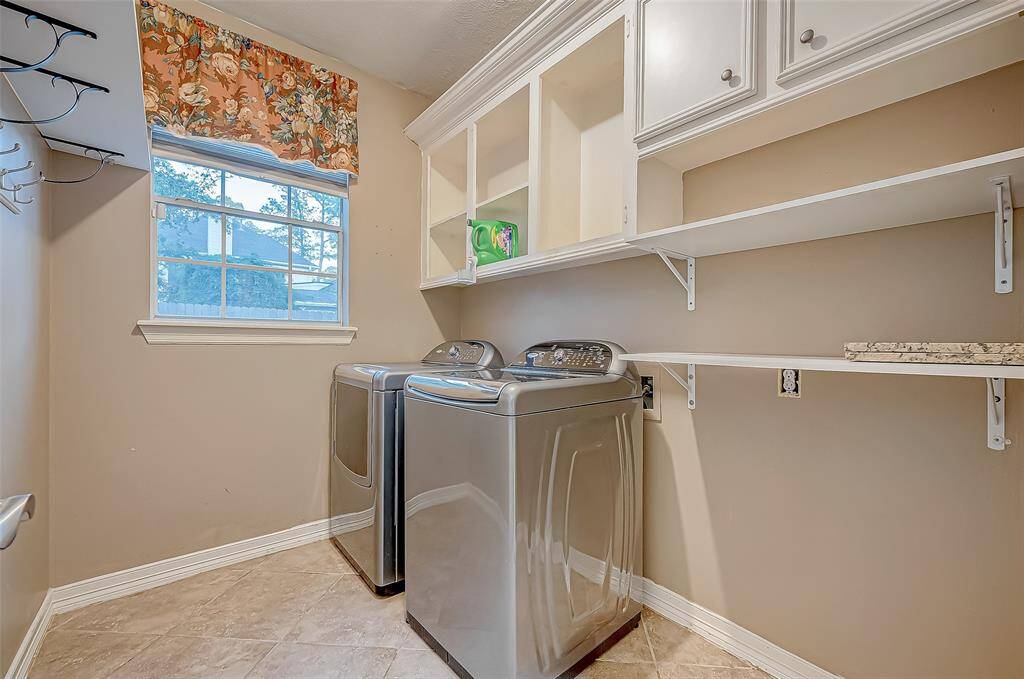 Oversized utility room located off the kitchen.  Washer, Dryer included.  Additional space for a refrigerator or folding table.