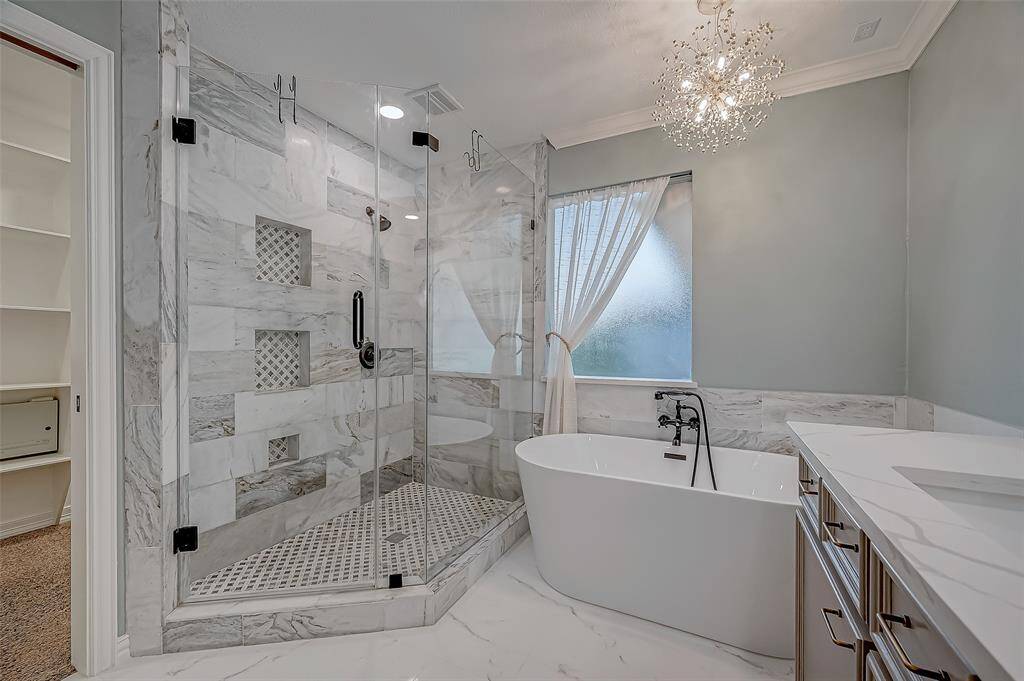 Oversized shower, free standing tub, beautifully updated.