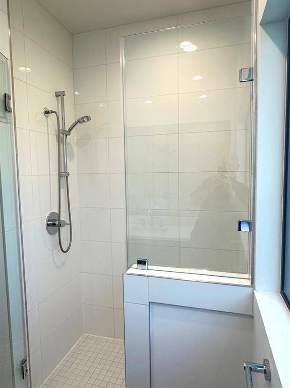 Second bath custom tile shower.