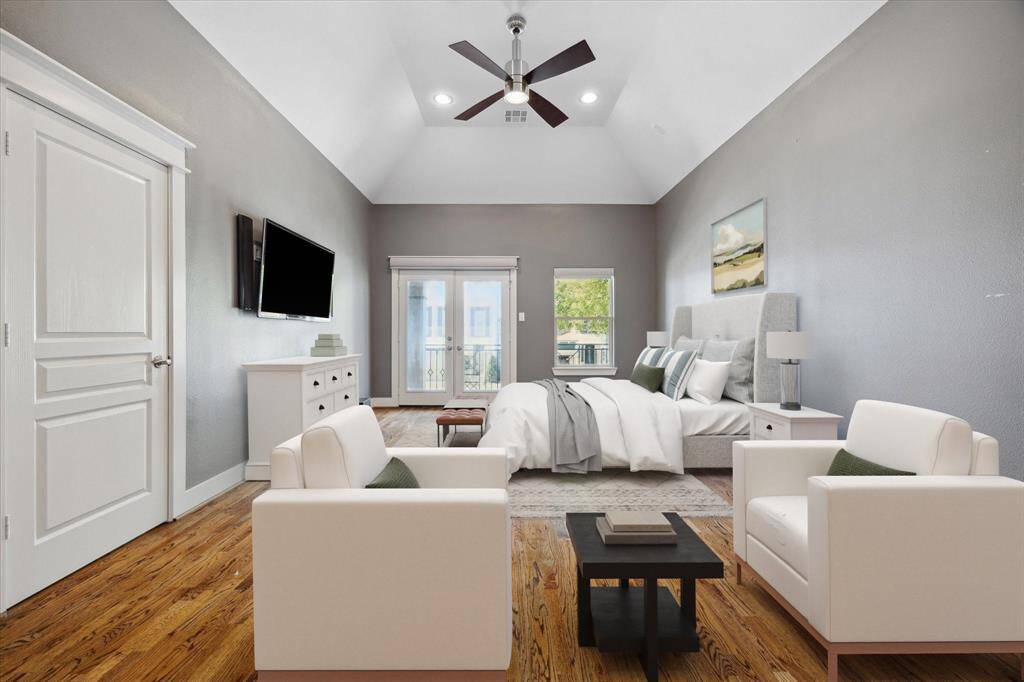 Virtually Staged: Primary Bedroom. Primary bedroom w/high ceilings and sitting area. Step out to front balcony just outside primary bedroom door.
