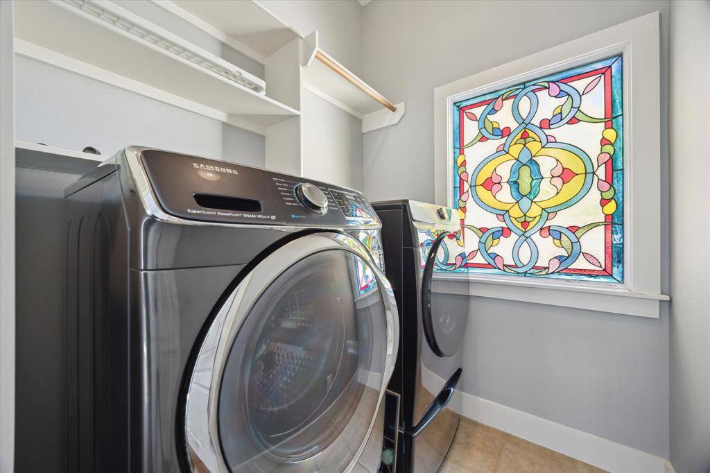 Huge laundry room on the second floor. Appliances stay.