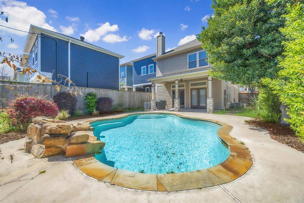 Absolutely gorgeous backyard w/a custom oversized Waterfall Pool with a huge rare  spacious yard!!!