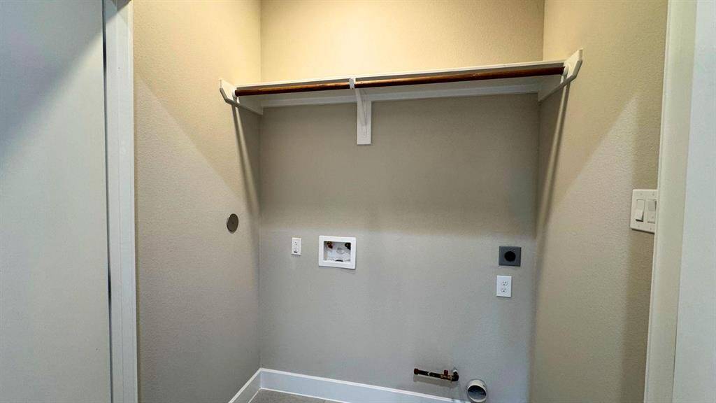 Washer and dryer connections are conveniently located upstairs.