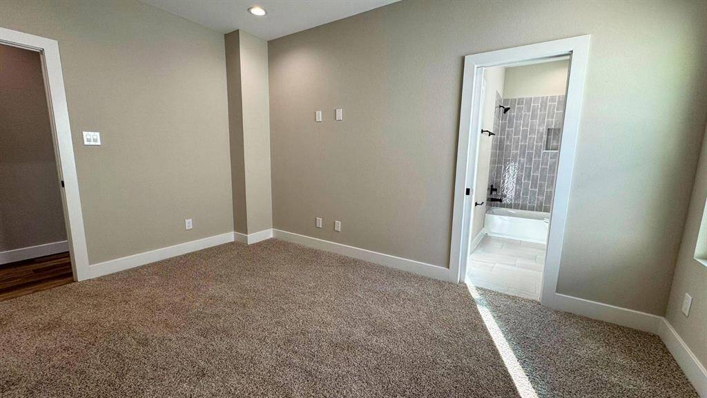 Large bedroom with convenient ensuite bath.
