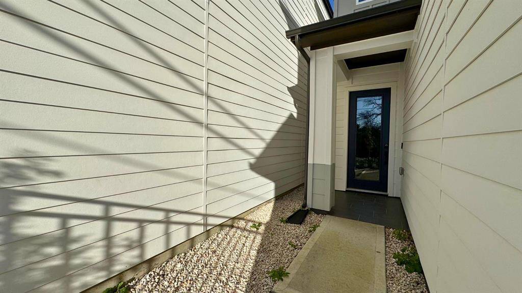 Sidewalk up to the door creates privacy.