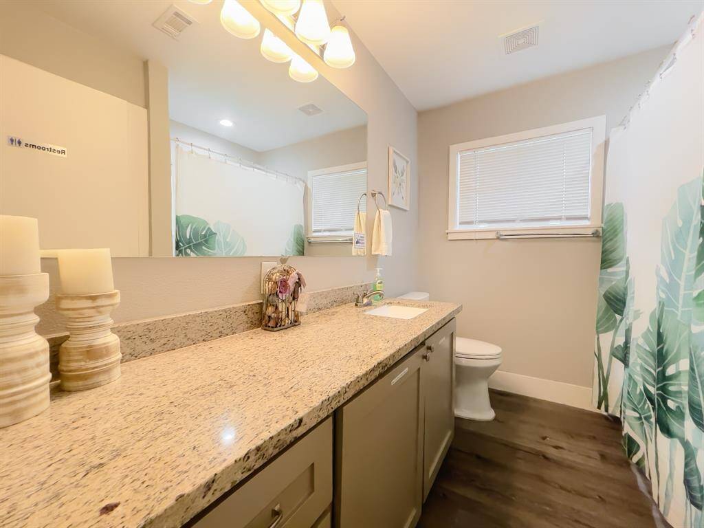 Guest Bathroom w/ tub in hallway