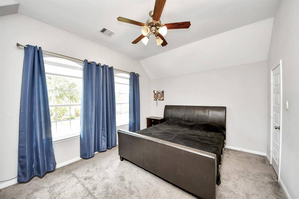 Spacious bedroom can serve as secondary primary suite.