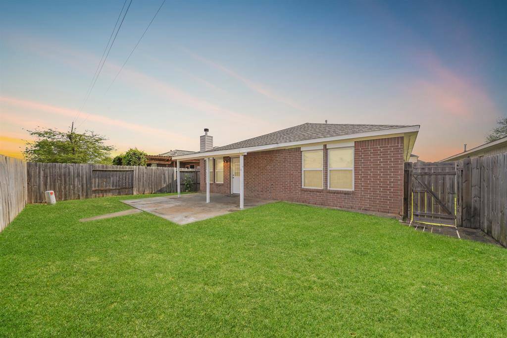 Welcome to your new backyard! Check out all of that wonderful green space for the kids and pets to run around in, and a fantastic patio perfect for entertaining family, friends, and guests.