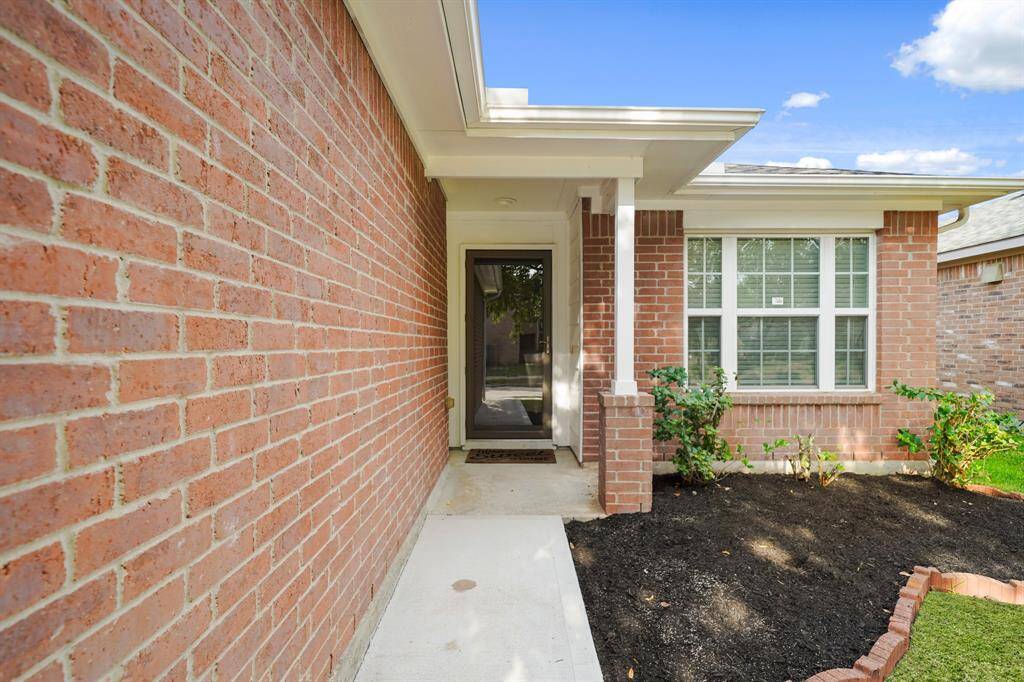 This captivating home boasts a grand curbside appeal and arrival experience - highlighting a beautiful brick exterior.