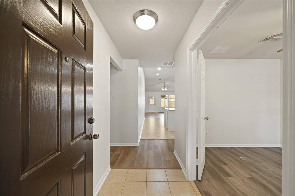 This gorgeous home has an inviting entrance that welcomes your family, friends, and guests.