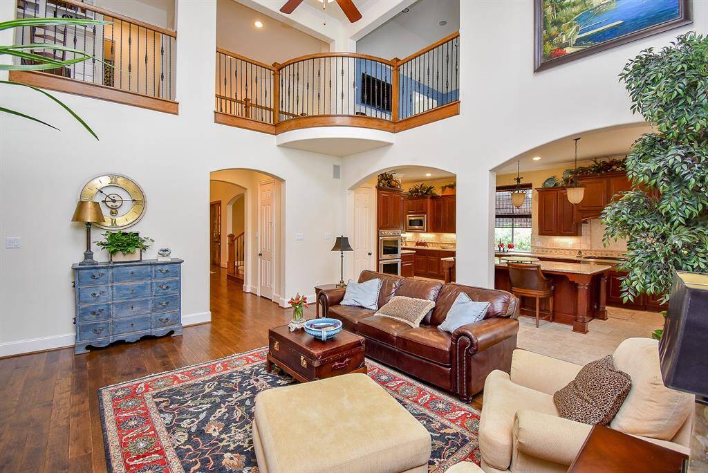 The  upstairs compliments the family room with a Juliet balcony. Open floor plan has a nice flow through the home.