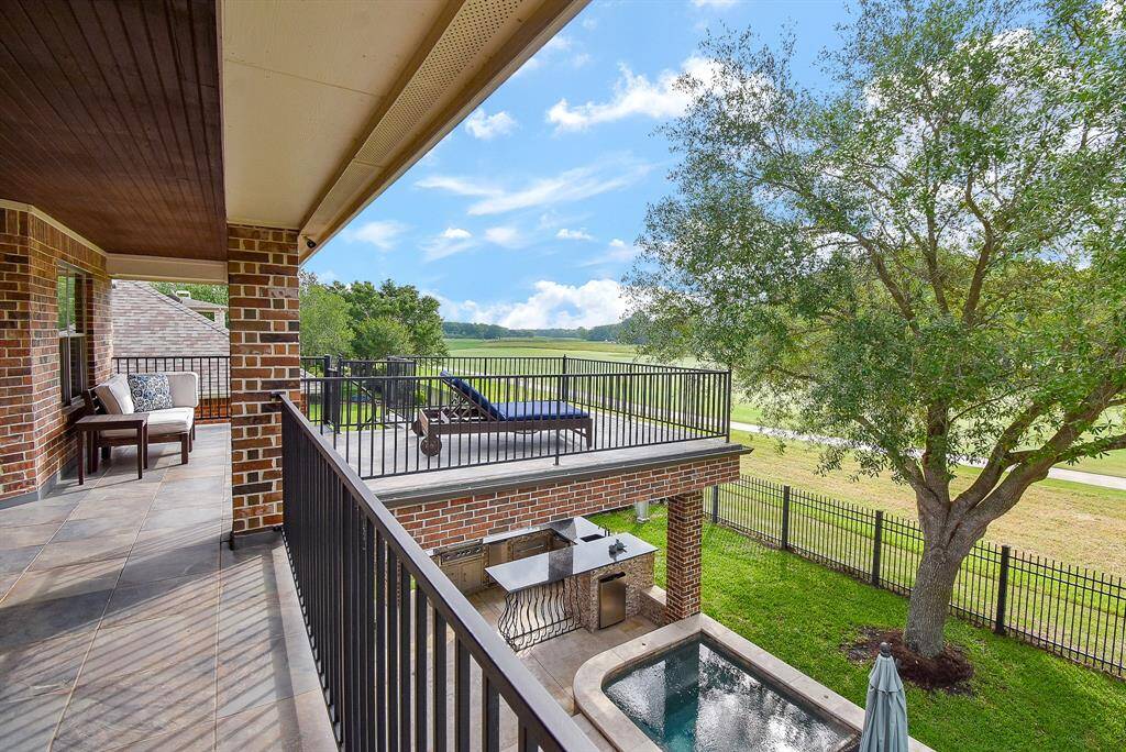 The uncovered area of the balcony is a perfect place to catch some rays.