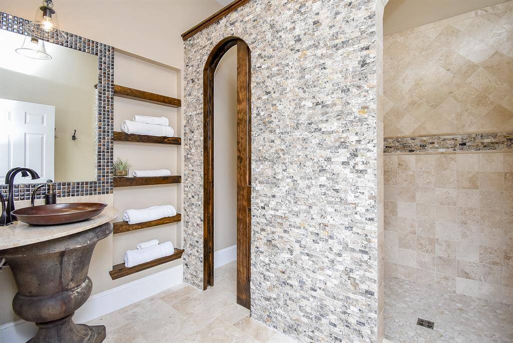 Resort style full pool bath will make you feel like you are at a spa.Walk in Shower. Extraordinary tile work with attention to detail.