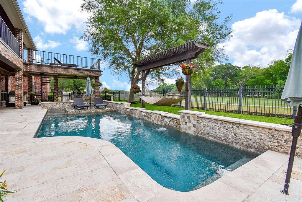 Another view of this fun recreational pool and living areas.