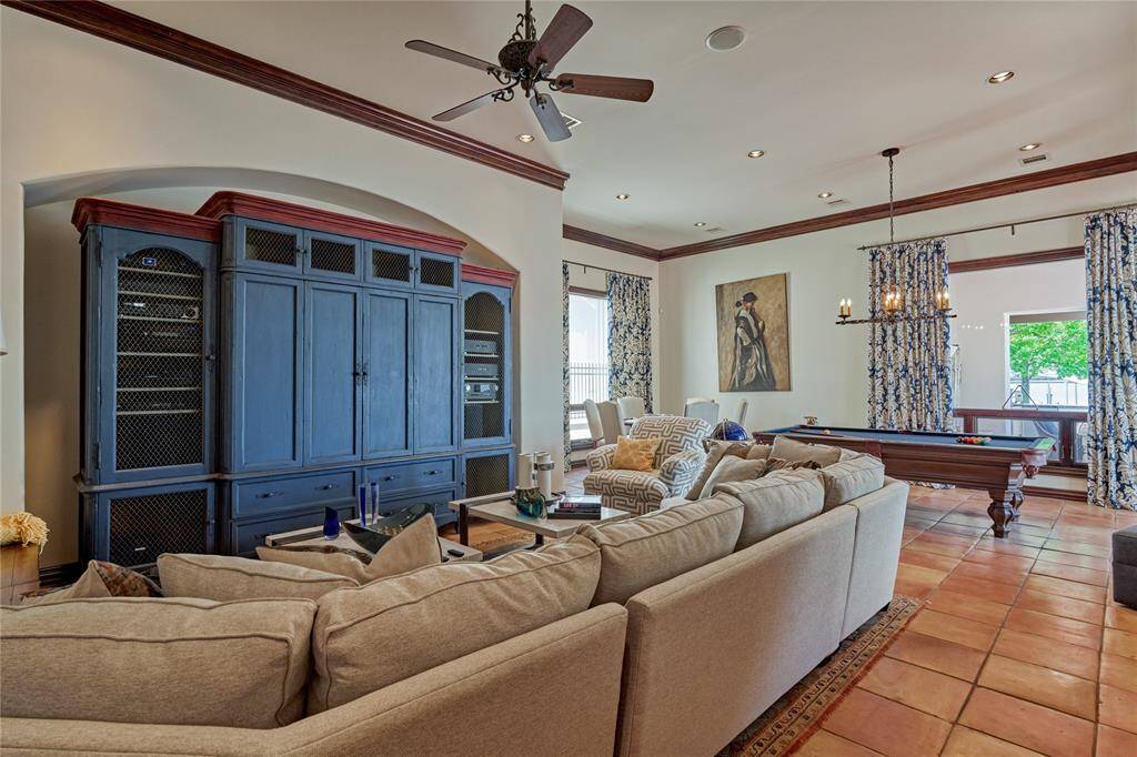 First floor entertaining includes this wow-factor game room complete with bar area and access to one ot the two verandas.