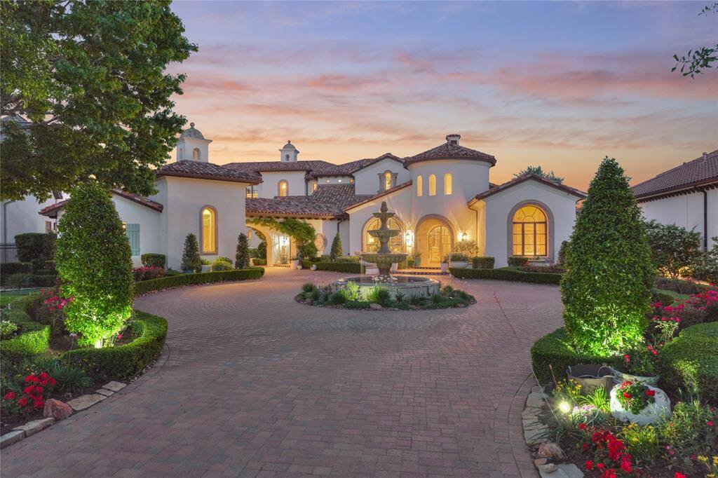 87 Benthaven Isle enjoys a private motor court, oversized garages with a total of 3 bays, golf cart storage, epoxy finished floors & storage.
