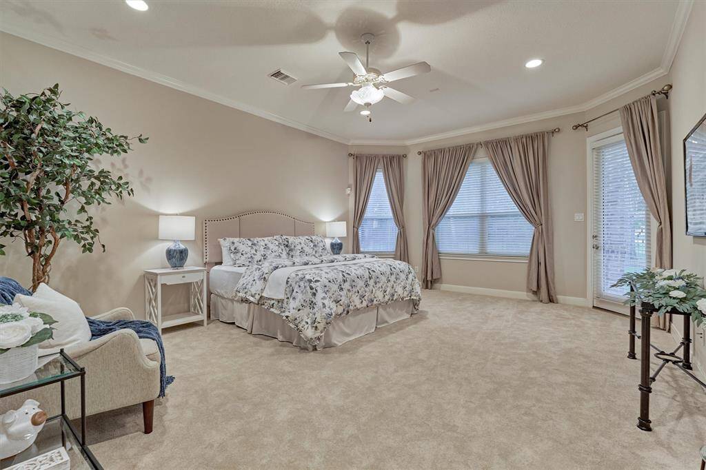 The primary retreat is a spacious and relaxing sanctuary with it's soft color palate. It has a private entrance to the outdoor patio.