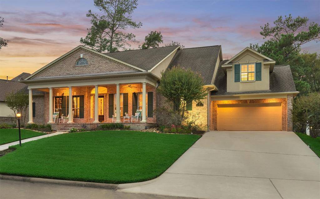 You are greeted by a perfectly manicured lush green lawn. There is a 2 car garage and a carport for extra covered parking.