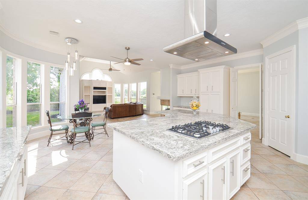 The Open Floorplan Concept Incorporates the Breakfast - Kitchen and Living Area