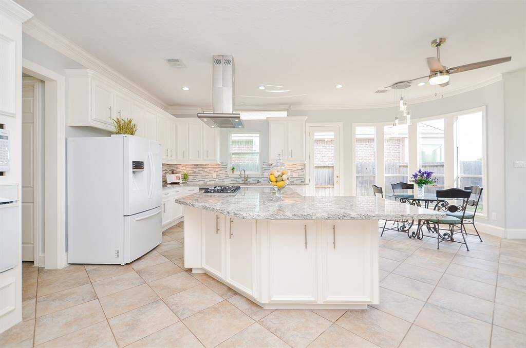 Large Kitchen Island open to Family Room