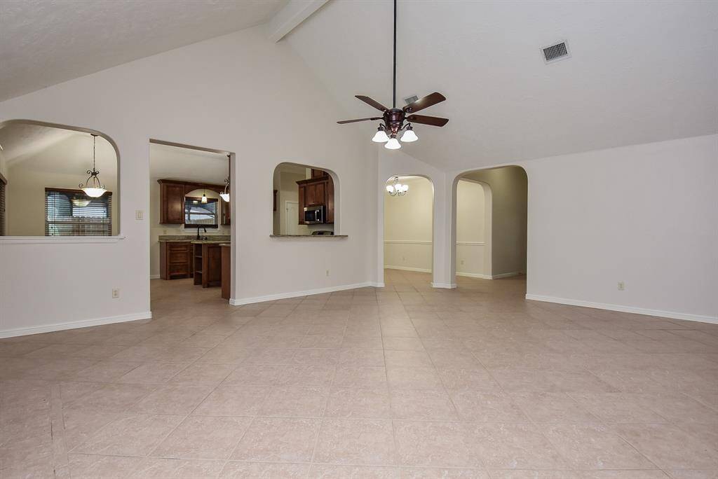 The comfort and convenience of this stunning (1) story home are appreciated here, with direct access into the chef's kitchen and hallways, leading to bedrooms.