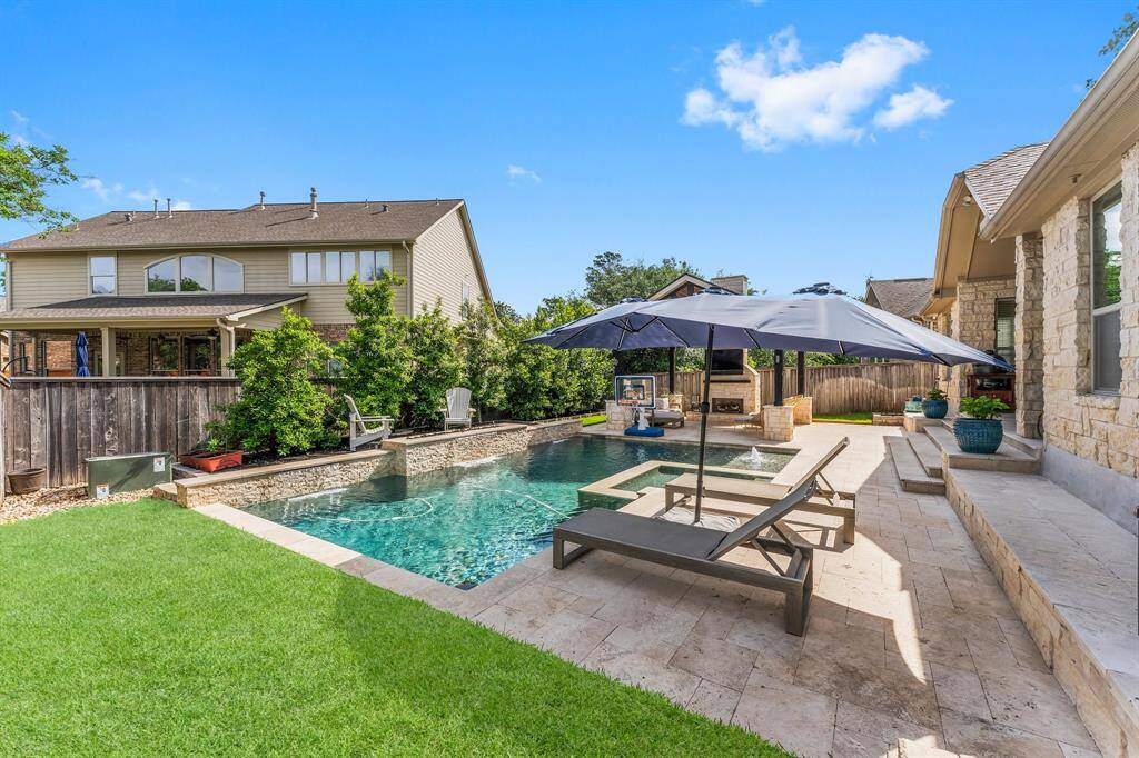 There's even some green grass for playing or pets.  Front and back irrigation keeps your yard looking fresh and green.