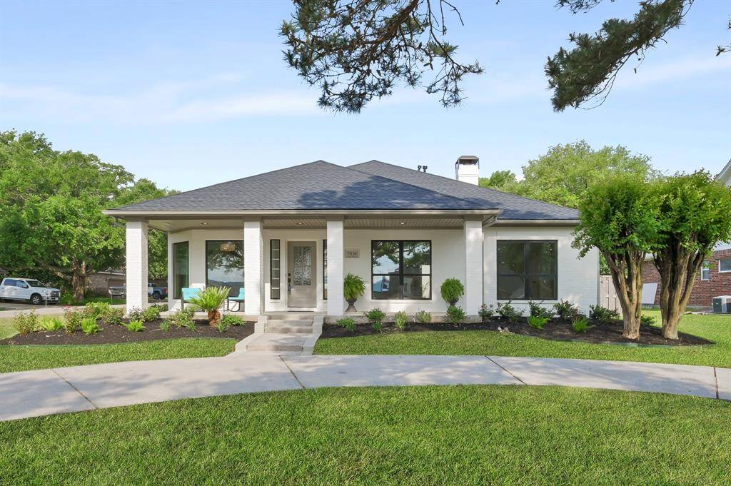 Welcome to 9834 E. Shore, with it's outstanding curb appeal and inviting front porch. Note the new roof!