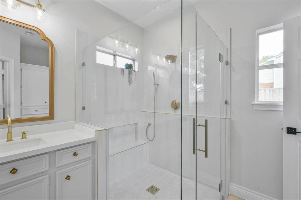 The secondary walk-in closet with built in offers extra space for storing footwear, hats and accessories.