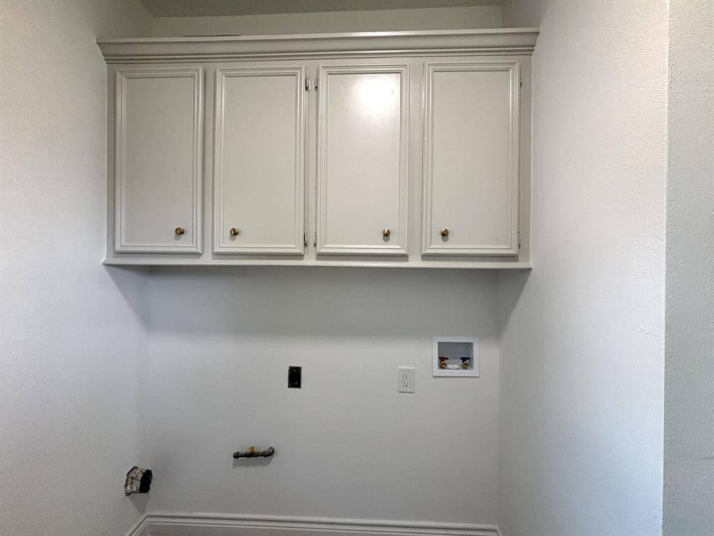 Large wood deck for your patio set or perhaps create an outdoor bar with shelving on the garage wall, endless opportunities.