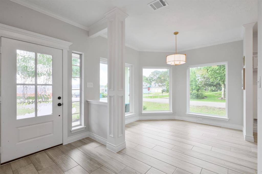Oversized picture windows allow you to take in lake views from all angles.