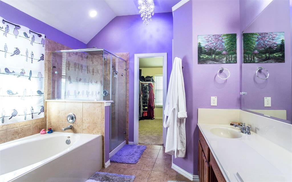 Primary bathroom with spacious walk-in closet