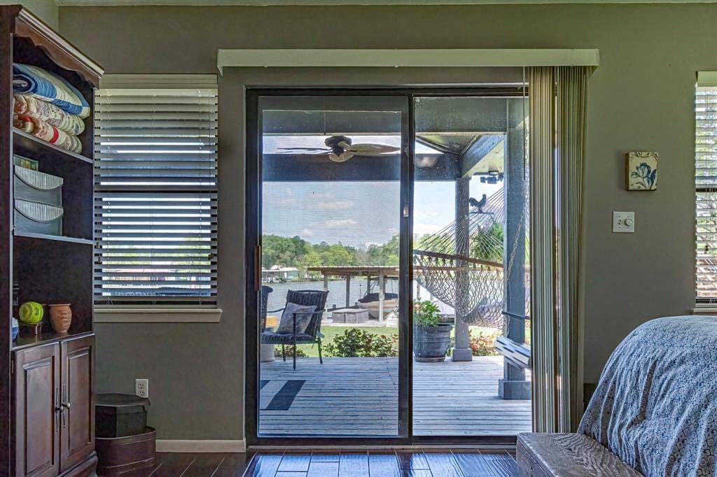 Primary bedroom has sliding door to back deck