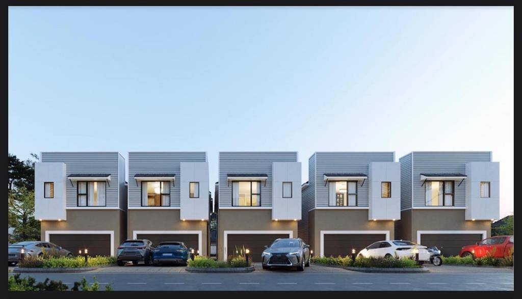 A row of stylish two-story homes featuring crisp gray and white siding and private garages. Photos are rendering, final product is subject to change.