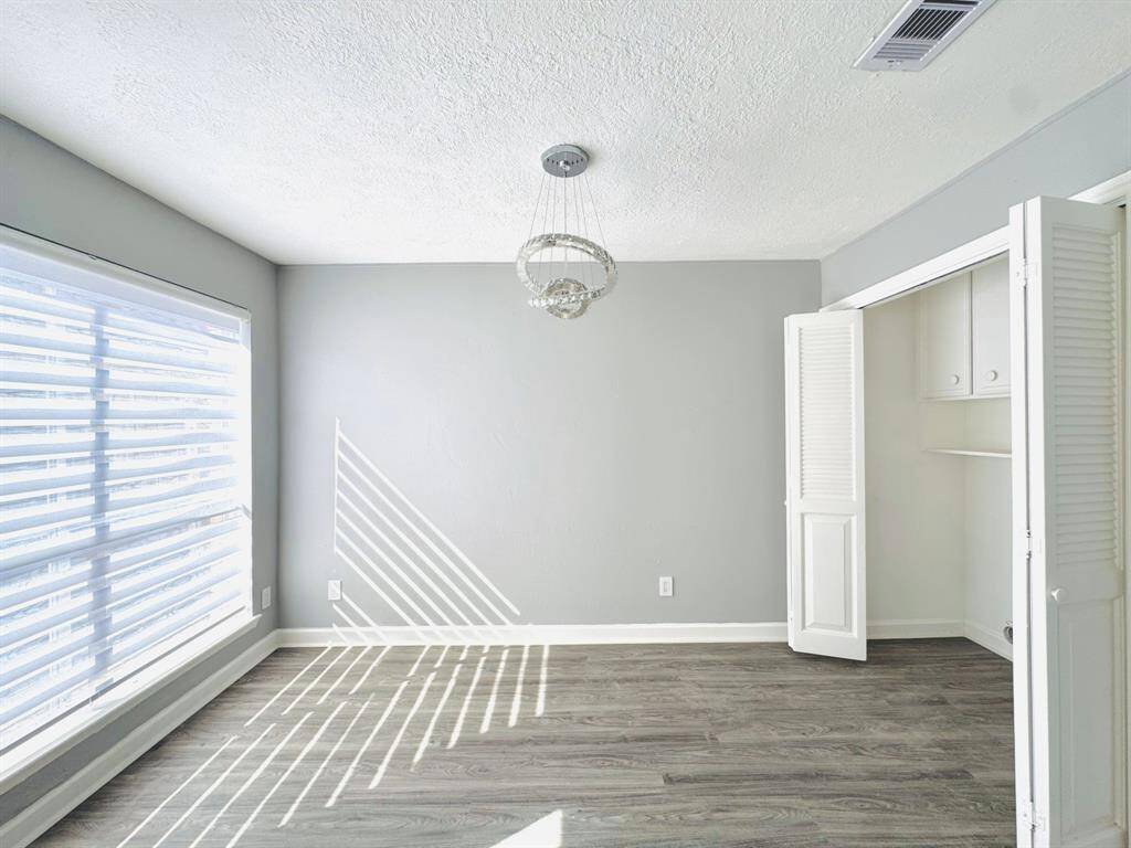 Adjacent to the kitchen, this elegant dining space is perfect for intimate meals or family dinners. The open layout enhances the flow of the home, making it a great place to connect.
