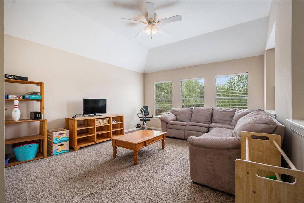Game room upstairs with large walk-in closet